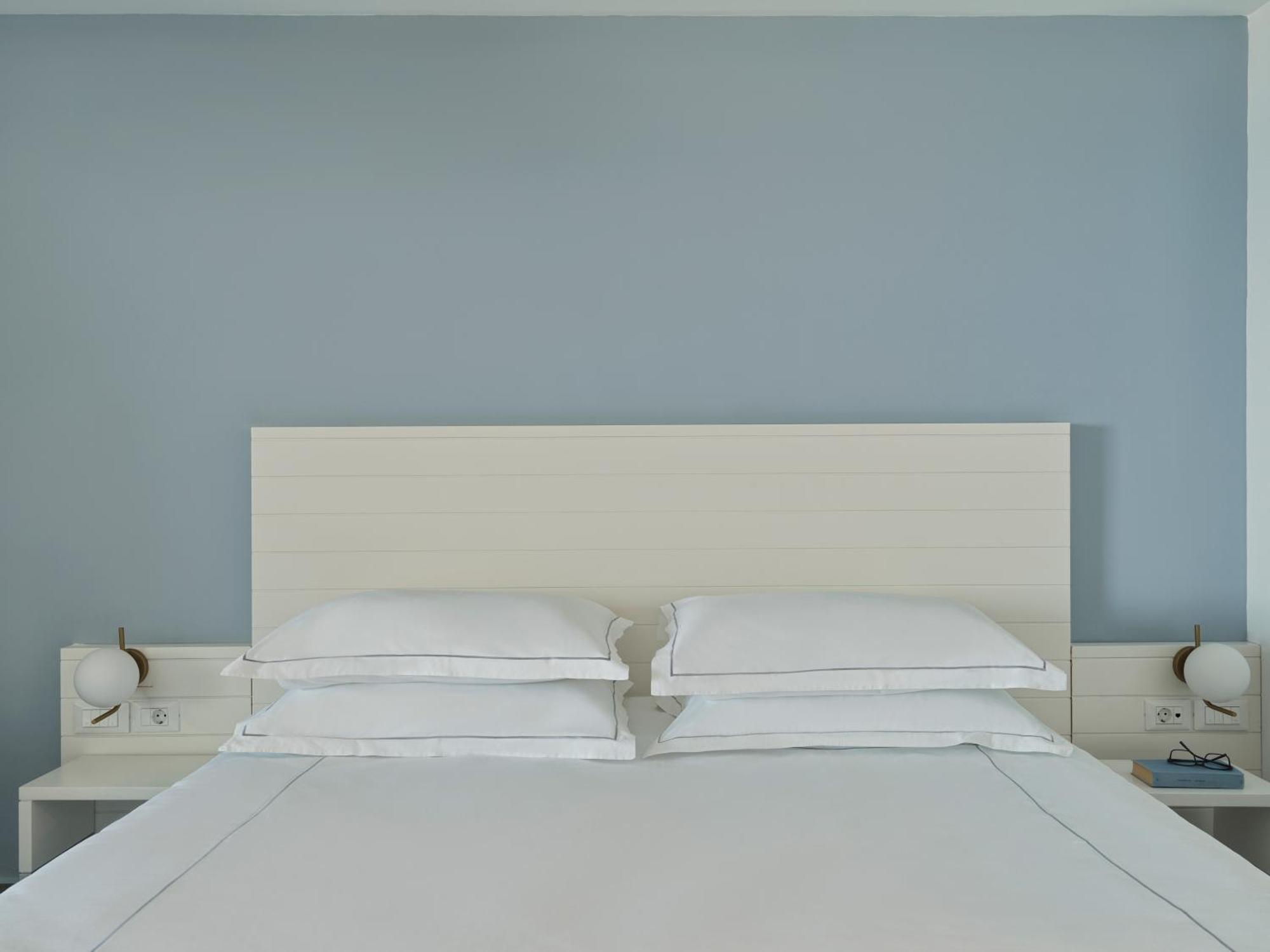Esperos Village Blue & Spa - Adults Only Faliraki Room photo A bed with two pillows
