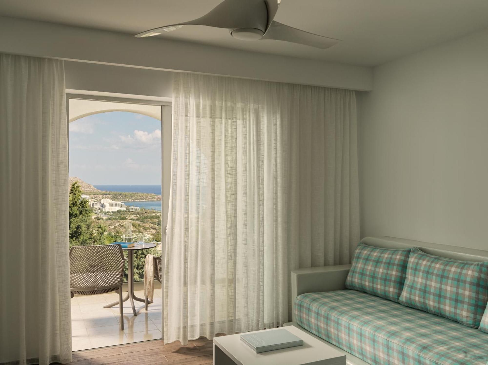 Esperos Village Blue & Spa - Adults Only Faliraki Room photo A ceiling fan in a hotel room